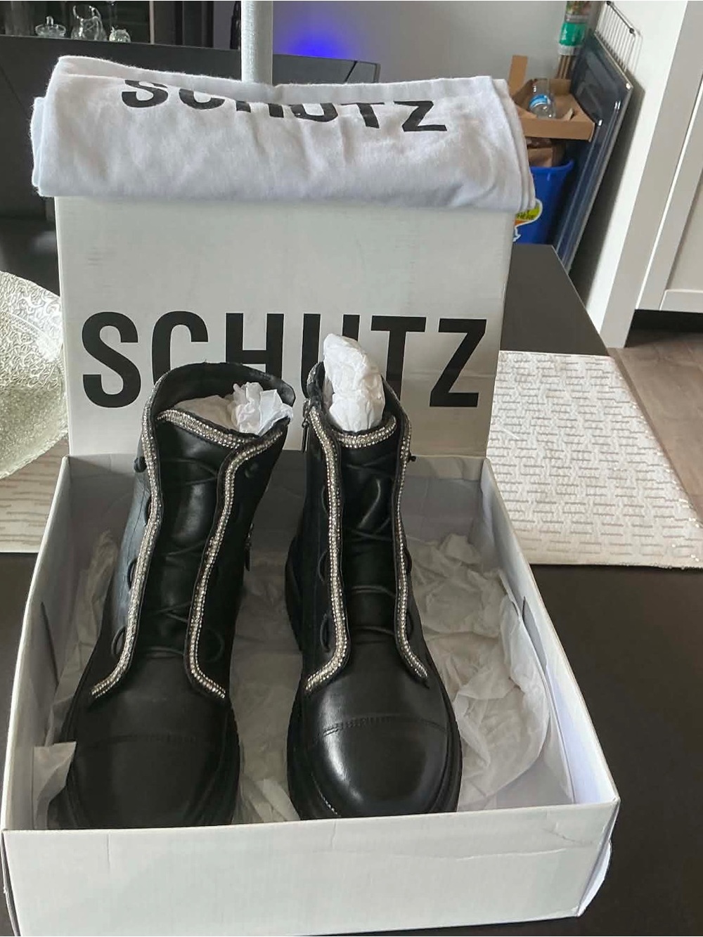 SCHUTZ Black Leather Ankle Boots with Rhinestone Zip Trim